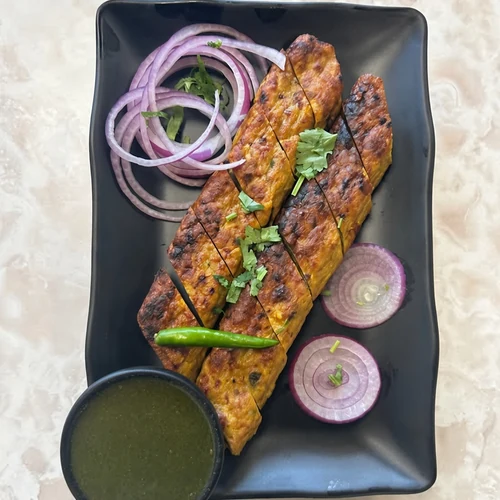 Chicken seekh kebabs with onions and green chutney at Lutf Indo-Pak Cuisine